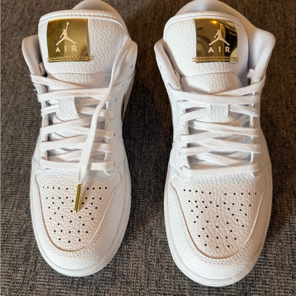 Air Jordan White Sneakers with Gold Accents